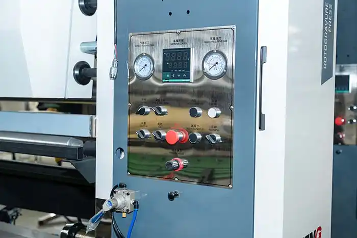 adjusting control panel on a modern gravure press with touchscreen interface